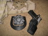 The holster next to the STRIKE and paddle platforms